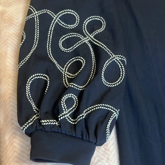 Ann Taylor Navy dress with adorable puff sleeves with white embroidered designs - Picture 3 of 11